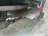 underside view of a truck with a flat bed and a flat bed