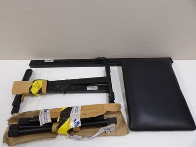 a laptop computer sitting on top of a table next to other items