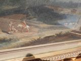 une image d'un tableau accroché au mur