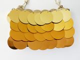 gold and orange ombre clutch bag