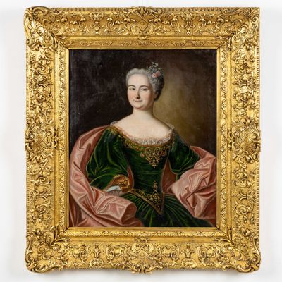 un tableau représentant une femme en robe verte, dans un cadre doré