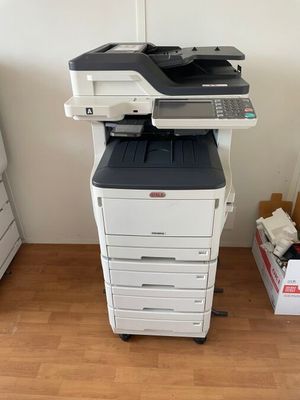 a printer that is sitting on top of a cart