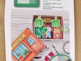 an image of a picture of a craft kit with a picture of a house and a window
