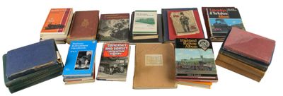 a lot of books that are sitting on a table