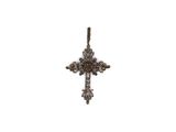 une image représentant un pendentif en forme de croix en diamant sur fond blanc