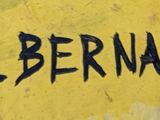the words ph bernard are painted on the wall of a building