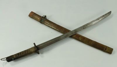 two knives that are laying on top of each other