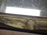 a close up of a window sill with a bird on it