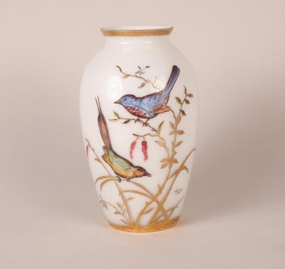 an image of a vase with birds painted on it