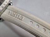 a close up of a watch on a white surface