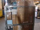 a large metal cart with a lot of boxes on top of it