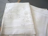 two napkins that are sitting on a table