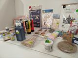 a table with various craft supplies and supplies on it