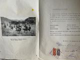 an open book with a picture of a group of people riding horses