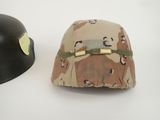 two helmets are sitting next to each other on a white surface