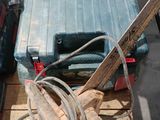 a picture of a tool box and a corded saw