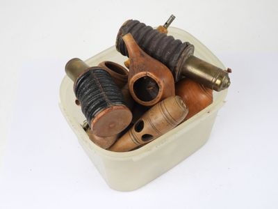a white container filled with different types of tools