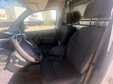 the interior of a van with the door open and the driver ' s seat up