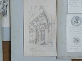 a picture of a drawing of a building on a table