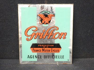 une enseigne portant l'inscription « Griffon » sur le côté d'un immeuble