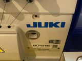a close up of a sewing machine on a table