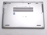 a laptop that is sitting on a white table