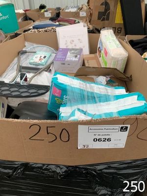 a cardboard box full of toilet paper and other items
