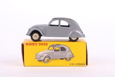 a small toy car sitting on top of a box