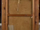 an image of a painting on a easel in a room