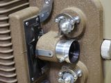 a close up of an old movie projector that is on display