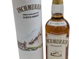 an image of a bottle of scotch whisky next to a cardboard box