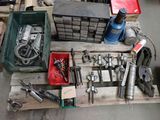 a lot of tools that are sitting on a pallet