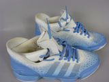 pair of white and blue sneakers with blue laces on them