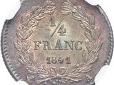a close up of a coin with a wreath on it