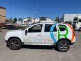 a picture of a vehicle with a peace sign painted on the side of it