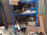 many boxes of tools on a shelf in a garage