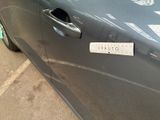 a sticker on the door of a car that says vapour
