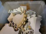 a plastic container filled with a lot of different items