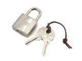 two keys that are attached to a padlock