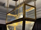 a light that is hanging from the ceiling in the room