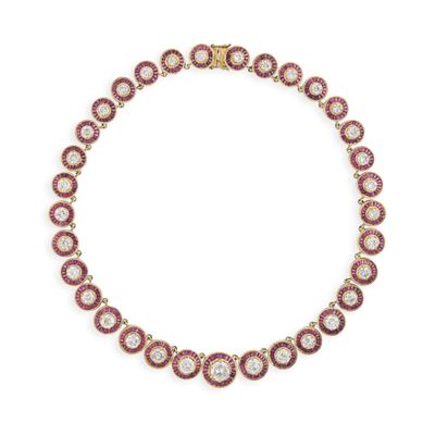 un collier en diamants et rubis, signé Van Cleef