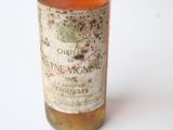 a bottle of wine that is sitting on a table