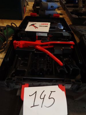 a lot of tools that are sitting on a table