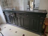an image of a kitchen with a black counter top