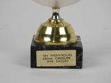an image of a gold trophy with a black marble base