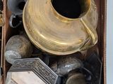 a box full of antique items on a table