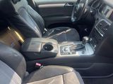 the interior of a car with a black leather seat and dashboard
