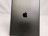 an apple ipad sitting on top of a table with a white background