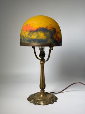 an image of a lamp with a yellow and blue shade on it