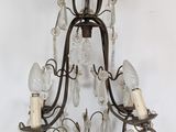 an image of a chandelier hanging from a ceiling in a room